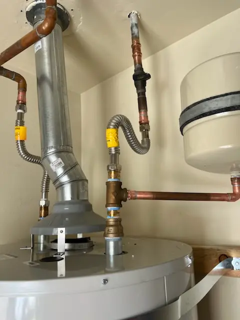 Water heater installation and plumbing repair in Winfrey